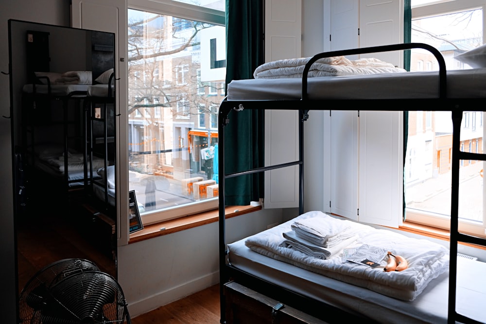 Hostel dorm room with bunk beds and lockers